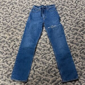 Classic High-Rise Blue Women's Jeans with Distressed Knee